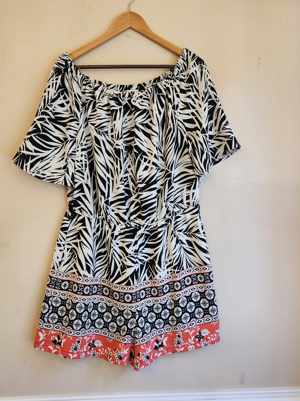 Women's Black & White Leaf Print Romper with Coral Hem